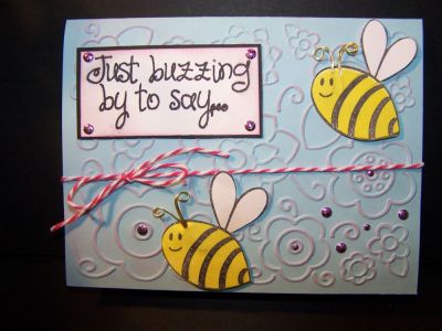 Just buzzin'
I was fussy cutting out the bee and decided to cut off the antennae and make some out of brass wire.  
