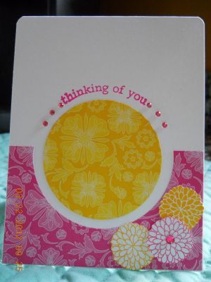April Flowers Inside View
I took the sentiment from Daisies2garden and gently placed it into a curved position to fit around my yellow circle layer.  I stamped the little mums onto white cardstock, cut them out and placed them on the card.  Added a few rhinestones to give it a little bling.
Keywords: Mums2stamp