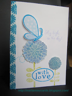 Mums and a Butterfly
Mums are stamped and embossed on watercolor paper and colored with watercolors. The butterfly is popped-up. 

