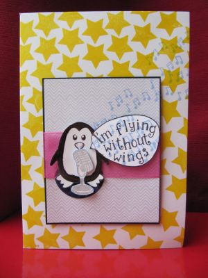 Card for a Westlife Fan
I just love Stephanie's penguins! On this card, I put the penguin center-stage so he could sing a wonderful Westlife song. Have you heard of them? They're a phenomenally successful Irish boyband. Their music is not really my taste, but you've got to admire how successful they are.  
