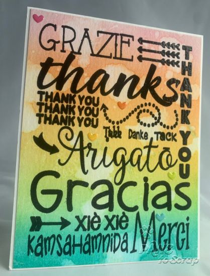 Created using distress inks on watercolor paper and then stamped and embossed in black.  
