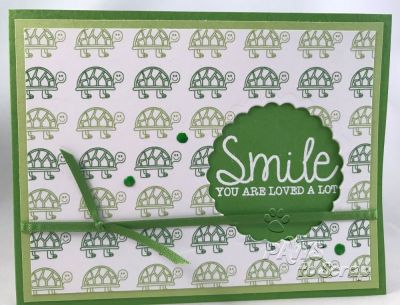 Smile
Supplies Used - Smile
Stamps and Dies:  Stamp Set from November 2017 Kit of the Month; Scallop Circle Dies (Sizzix);
Ink & Embossing:  Versamark; White Embossing Powder (Hero Arts)
Paper: Cardstock and Pattern Paper from November  2017 Kit of the Month
Other: Ribbon from November 2017 Kit of the Month; Lily Pad Enamel Accents (Ranger)

Keywords: November Card Kit