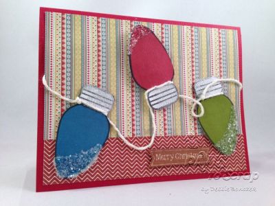 Merry Christmas
Created this card using the newest lights4Christmas stamp set.  LOVE this set.  I used ColorBox inks and Sprinkles glitter on the lights (love that chunky glitter).  I used cardstock from my stash along with Authentique pattern paper and The Twinery twine.  I also used a silver metallic ink pad on my lights, and my center light has an Action Wobble on it.  
Keywords: Sprinkles lights4Christmas ColorBox