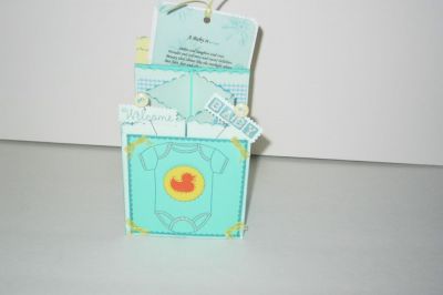 Concertina Fold Onesie Card
Concertina fold w/pocket for sentiment card to be inserted. 
Keywords: Onesie baby