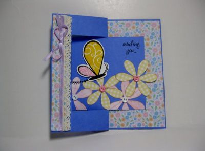 Sending you
Made this card from the flip it card base sent in the January club mailing.  I used the S.B. Stamps of Life set butterfly2build and the S.B. Sizzix butterfly die set.  The flowers were made from the small wing die.  
