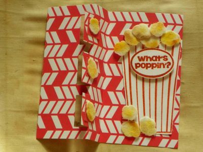 Popin'
Made the popcorn with Stamps of Life white felt die cut then colored with some Pan Pastels.

