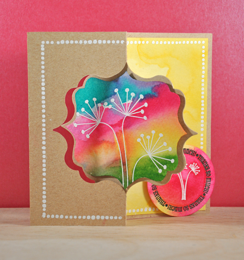 Thanks
The circle punch on the front helps hold the card closed - another view.

Stamps: Thanks2You by the {stamps} of Life
Ink: ColorBox Popcorn White Chalk Ink by Clearsnap, Black Mix'd Media Inx by Clearsnap
Paper: Straw 110# and Banana Pop-Tone cardstock by DCS, cold-pressed Watercolor paper by Fabriano
Other: White embossing powder by Ranger, Fancy Frame Flip-It by Sizzix, circle punch by EK Success, Mowed Lawn, Squeezed Lemonade, Peacock Feathers and Picked Raspberry Distress Stains by Ranger
Keywords: Flip-It Contest