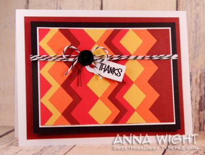 Indian Blanket Inspired
I used the large chevron border die to create lots of cuts in various colors. Once the layers were all adhered in place, I ran the panel through my BigShot without any cutting dies, and mashed all the layers together so they're all flush w/ each other. Smooth as can be!
