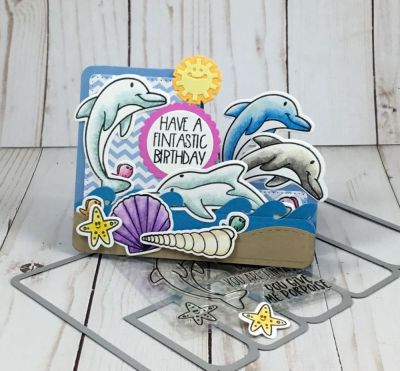 Jumping Dolphins
Keywords: rounded step up card die dolphins beach ocean scene