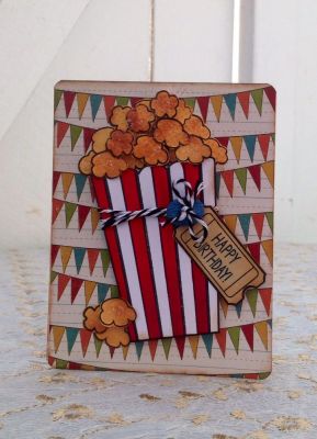"Caramel Popcorn"
I used distress ink, glossy accents, and S.B chunky glitter on the popcorn.
