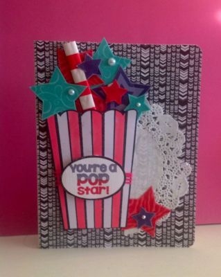 "You are a POP star"
I stamp the stars with clear embossing powder and three different colors of card stock, them fussy cut. The popcorn container is color with some copic marker. I finish the card with pearls, paper straw, pink thread and dolly.
