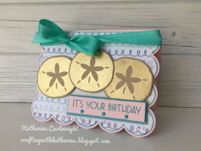 Keywords: Sand dollars embossed in gold