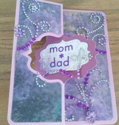 Mom & Dads 62nd Anniversary Card Using Sizzix Flip It Templet & Blings
I Love blings & cards that are fast making.  I made two cards while doing this.  I just didn't decorate the second one.  The Flip It Card was fast & Easy.   I made this in a half hr. from start to finish.  
Keywords: Flip it Templet