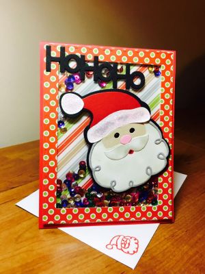 Santa shaker card
Santa2 stamp dies
Hohoho die 
Happy holidays pattern paper
Rectangle stitched dies

