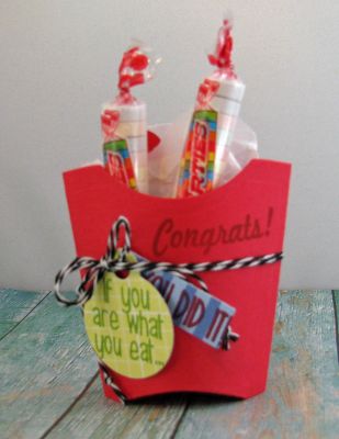 *you are what you eat..
This is the super cute french fry box die, but it's filled with smarties candies instead.  I used stamps from the graduation stamp set, too, for a congrats treat.  Get it... you are what you eat.. smartie!  ;)  
