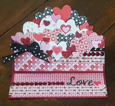 *love
Regal stand up card die set.  sizzix heart framelits. heart dies from bandage die set. papers and washi tape from TSOL. :)
