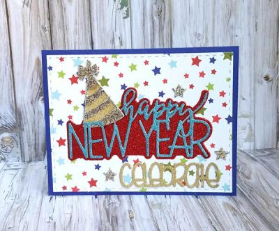 Happy New Year
Trendy word die set: happy new year.  Also used: party hat triplits, celebrate word die TSOL, and stitched rectangle die.  Papers TSOL.
