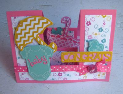 *congrats baby
umbrella triplits. sizzix step up card die set. congrats from sizzix drop in set. sizzix baby triplit dies and ink transfer sheets. papers TSOL
