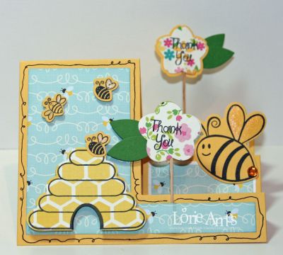 Bee Side Step Card
Oh gosh...I think this has taken top spot as a favorite!  I had a slightly different idea to begin with but went with the flowers when I when I saw them on the front of the Side Step Die envelope as I could stamp 'thank you' on the flower itself.  
Keywords: bee4me hive4bees thank you