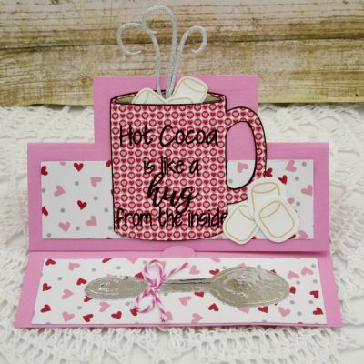 Hot Cocoa is like a Hug from the inside 
hotchocolate2stamp
Mini Square Stand-Up
TSOL cardstock, ink, patterned and glitter paper
