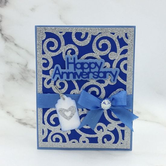Happy Anniversary
Happy Anniversary Word Die, Swirl Background Die, TSOL tag, papers and seambinding 
