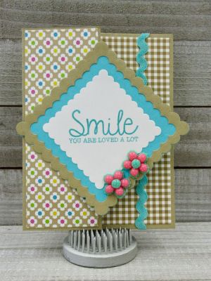 Smile You Are Loved A lot Scalloped Squares
Scalloped Square Dies, Sizzix Half A2 Card, November 2017 Card Kit (sentiment),TSOL papers, ink and embellishments 
