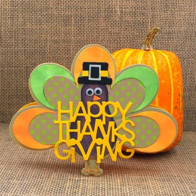 Pilgrim Turkey
Turkey Fold-it, snowman dies,   Sizzix Happy Thanksgiving 3-D Drop-ins Sentiments, TSOL glossy paper, cardstock, patterned paper and inks
