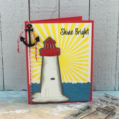 Shine Bright
lighthouse2stamp, sunburst2stamp, sailboat dies, TSOL papers, ink, twine
