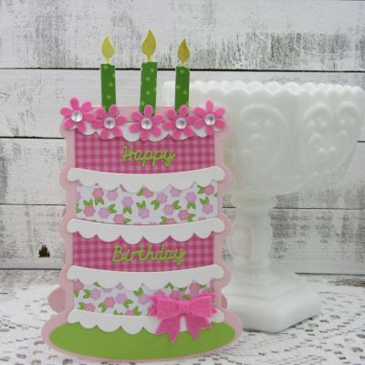 Happy Birthday Cake
Cake Fold-its, Mini Bow Die, TSOL Mini Flower Dies, Sizzix Happy Birthday Die, TSOL papers, felt and candy dot embellishments
