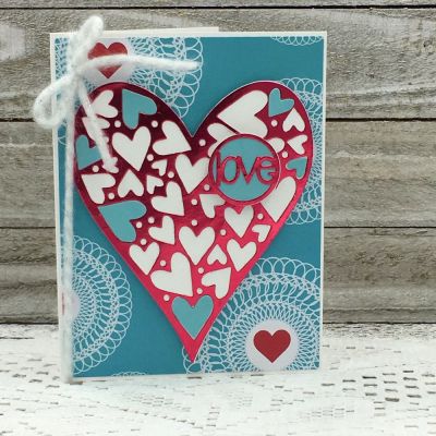 Love
Exclusive Heart Background Die, Sizzix Word Circle #2 Set, TSOL Patterned Paper & Cardstock
