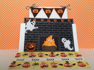 A Haunting We Will Go
Sizzix XL Die- card, square stand-ups
banners4fall- pumpkin banner and boo sentiment 
Stickers
Google eyes
Thanks for looking:)
