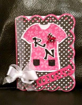 Congrats RN
I love this card! I used the t-shirt to make a 'scrub top' with pockets at the bottom of the scrub shirt. RN letters are from Sizzix graffiti set. Congrats is for my co-worker, friend and previous RN clinical mentor who is retiring next month. I'm so excited to give her this card! 
