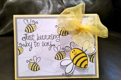 Just buzzing by to say...
inside has "Happy Birhday" word dies with coordinating colors gray and yellow, some bitty bees are stamped inside
