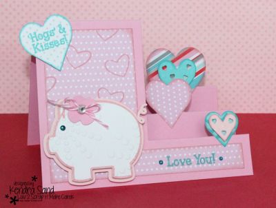 Hogs n' Kisses
Keywords: piggybank2stamp  PiggyBankDieSet Sizzix FlowerBurst morepiggy2stamp Step-Ups