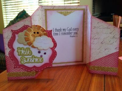 Hello Sunshine 2
5.5 X 12"
Score 2", 4", 8", & 10"
Mark 1.75" from top on sides and cut triangle to 4" score line
Repeat with other side at 8" score line 
Attach reverse side of triangle at bottom
