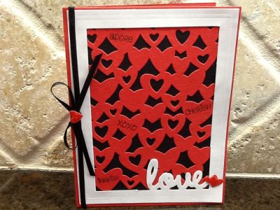 love
the 'bling' hearts are cut outs from the background die sparkled up a bit with glossy accents & glitter
