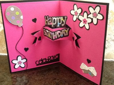 banner birthday
the happy word is attached inside banner by two pieces of clear acetate.
