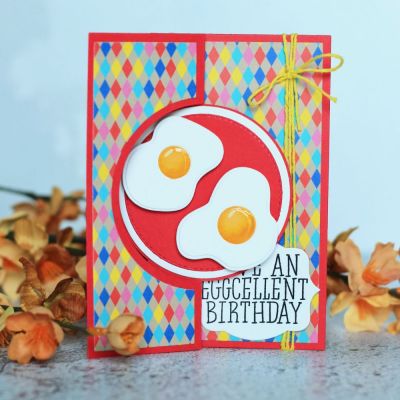 Have An Eggcellent Birthday! 
Bacon&eggs2stamp and Dies, Sizzix Circle #4 Flip-its

Yolks (Diecut yolks from smooth white cardstock. Color with Copics Y32, YR21, Y19, and Y17.  Once dry and attached to center of egg, add Glossy Accents to give the yolk dimension). 
