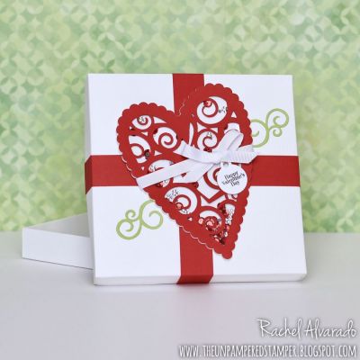 Scallop Hearts Fold-it Box
Sizzix Scallop Hearts Fold-its, TSOL Cranberry Cardstock, Minitags2cut Stamp and Die Set (tag), Sizzix Heart Step-ups Die Set (green flourishes)

