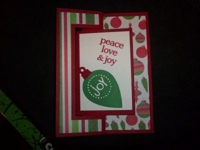 Christmas Gift Card Inside
This card was created with TSOL cranberry paper, stamps, & dies to give a movie and dinner to my grandson.  
