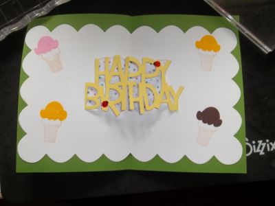 Happy Birthday Card
I used paper and a felt ice cream cone from the June 2016 card kit in addition to the 3-D Drop-ins Framelit card die set and the Sizzix Ice cream cones & bars stamp set to make this sweet summery birthday card.
