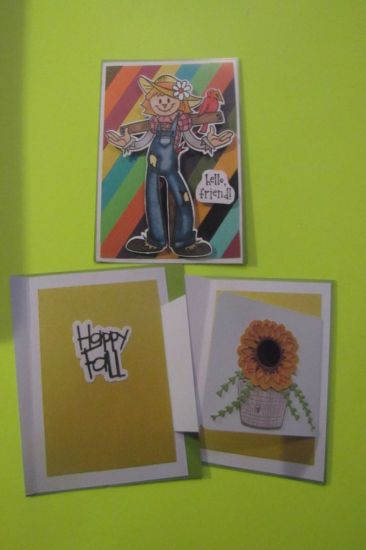 Fall Scarecrow card
This is a double fold card.  The scarecrow is on the front; the sunflower is on an inner fold, and the sentiment is on the inside of the card.

