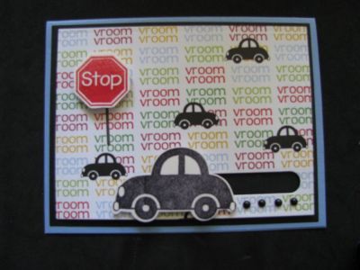 Happy Birthday Slider Car Card - Outside
I used the Sizzix Cars Stamps & Dies set, a Penny Slider die, and paper, black dots, and a felt balloon  from the January 2015 Card Kit to make this cute card.
Keywords: Sizzix Car Stamps & Dies