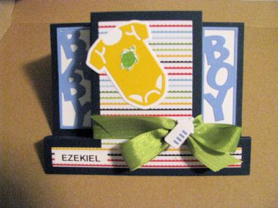 Welcome Baby Zeke
I used the Cute-as-a-Bug step-up card to make this card.  In addition, I used the Onesie Triplit dies, the turtle stamp from Stamp2Build, and ribbon & paper from the February 2018 card kit.  
