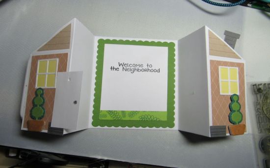Welcome Neighbor Card-inside
I had to do some editing of this set because the triangles didn't exactly work out.  The one designed for the right side, didn't fit on the left side, so I just cut them with a scissors.  I had to change the door to match more closely to the home.  
