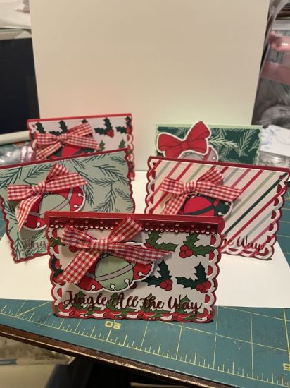 A-1 card bases (scalloped and deckle edge), Jingle bell cut outs from paper pad
