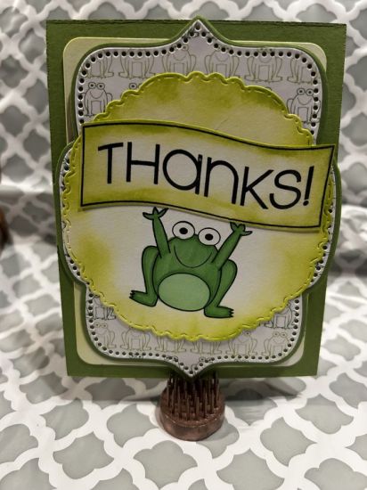 Thanks 
Thank a card using the cut frog holding the banner sign
