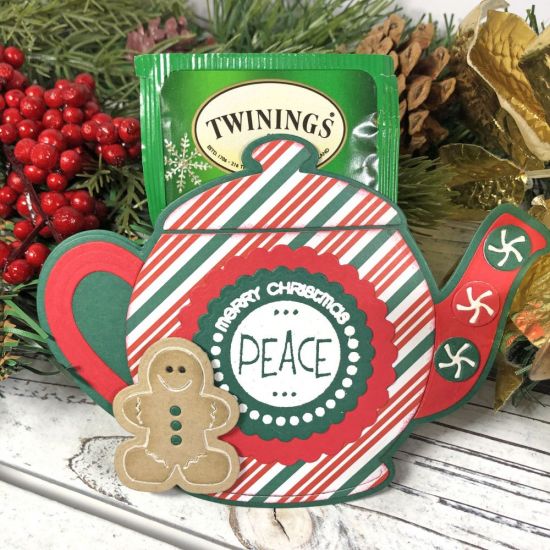 Tea Bag Holder
A tea bag holder is a perfect gift idea for a friend, co-worker, teacher, or loved one. I used the Tea Pot Fold-it die set from The Stamps of Life. These tea bag holders have a bag of holiday tea and a honey packet inside. To see how I made these, watch my video tutorial.


