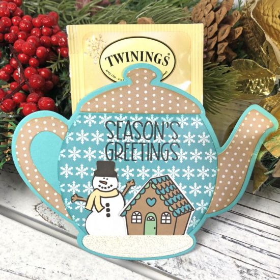 Tea Bag Holder
A tea bag holder is a perfect gift idea for a friend, co-worker, teacher, or loved one. I used the Tea Pot Fold-it die set from The Stamps of Life. These tea bag holders have a bag of holiday tea and a honey packet inside. To see how I made these, watch my video tutorial.

Keywords: Blog Post - https://lisamearscarddesigns.com/2020/12/01/tea-bag-holder/