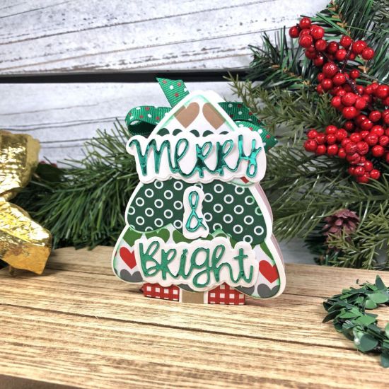 Candy Bar Slider
Here's a fun gift idea for the holidays. I made a candy bar slider box using the small TT Box from The Stamps of Life and I put a small candy bar inside. These boxes are a perfect for any occasion, but I used them here for Christmas-themed boxes and decorated with my stamps and dies. 
Keywords: ChristmasTree2Stamp